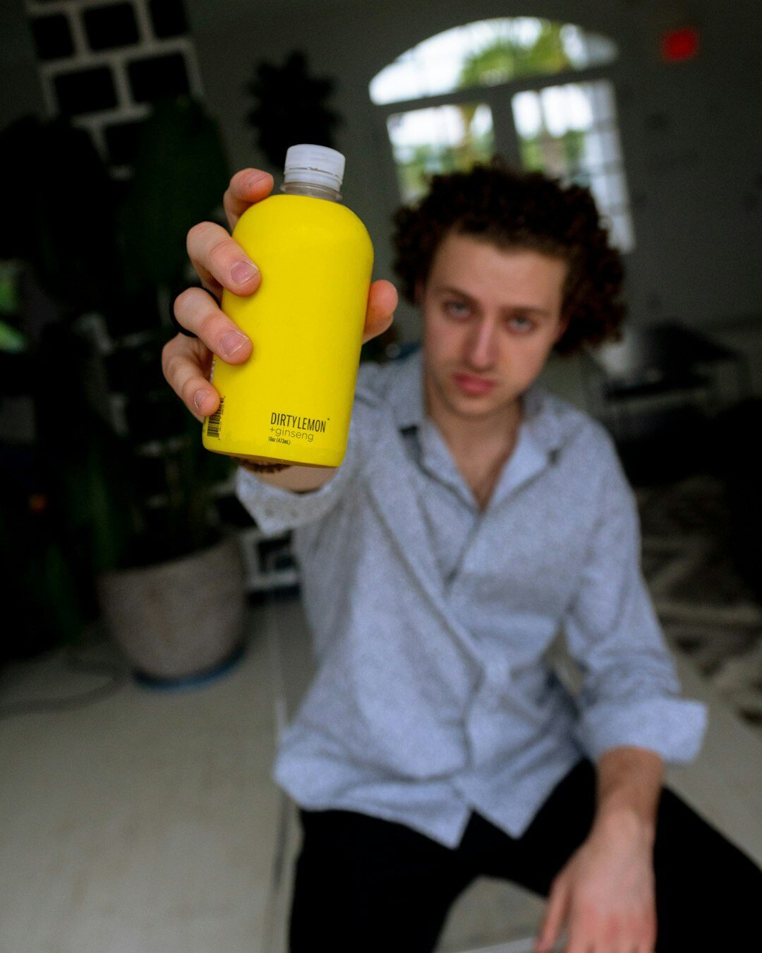 celebrity holding product